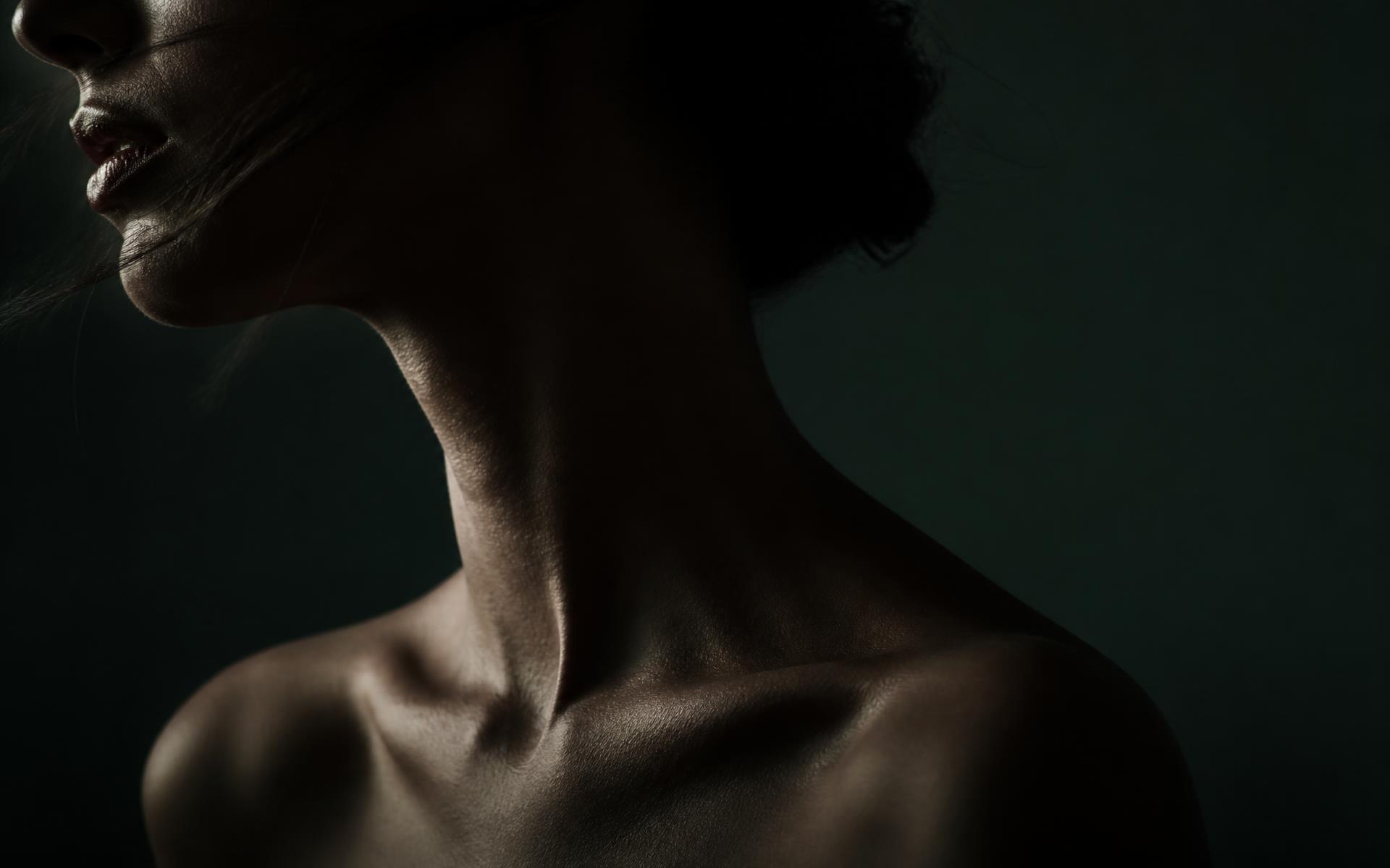 Editorial low-light portrait evoking discretion and privacy